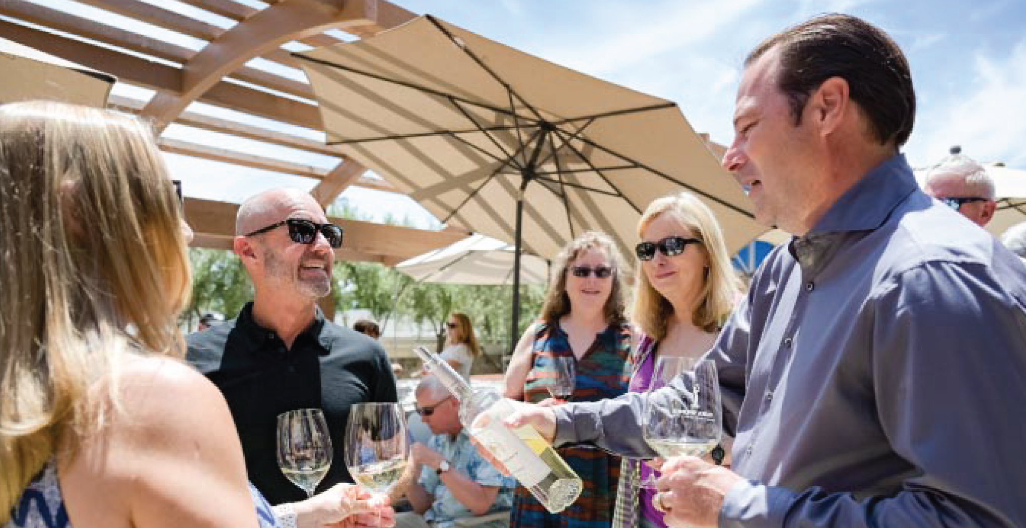 Flora Springs Club Members Enjoying Wine at the Member Appreciation Summer Party.