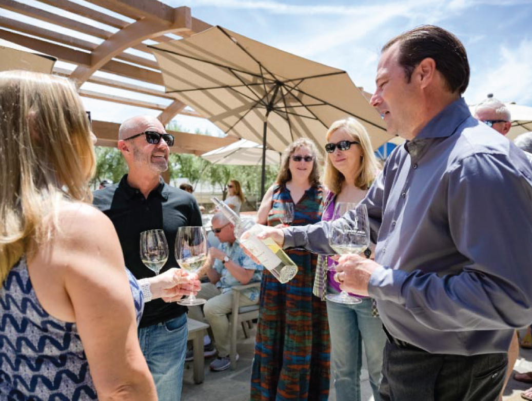 Flora Springs Club Members Enjoying Wine at the Member Appreciation Summer Party.