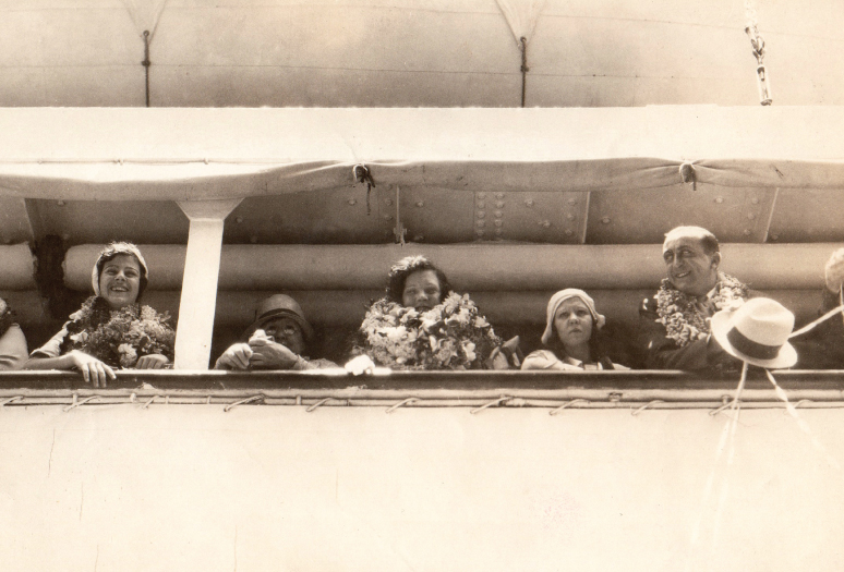 Flora Komes On Boat With People.