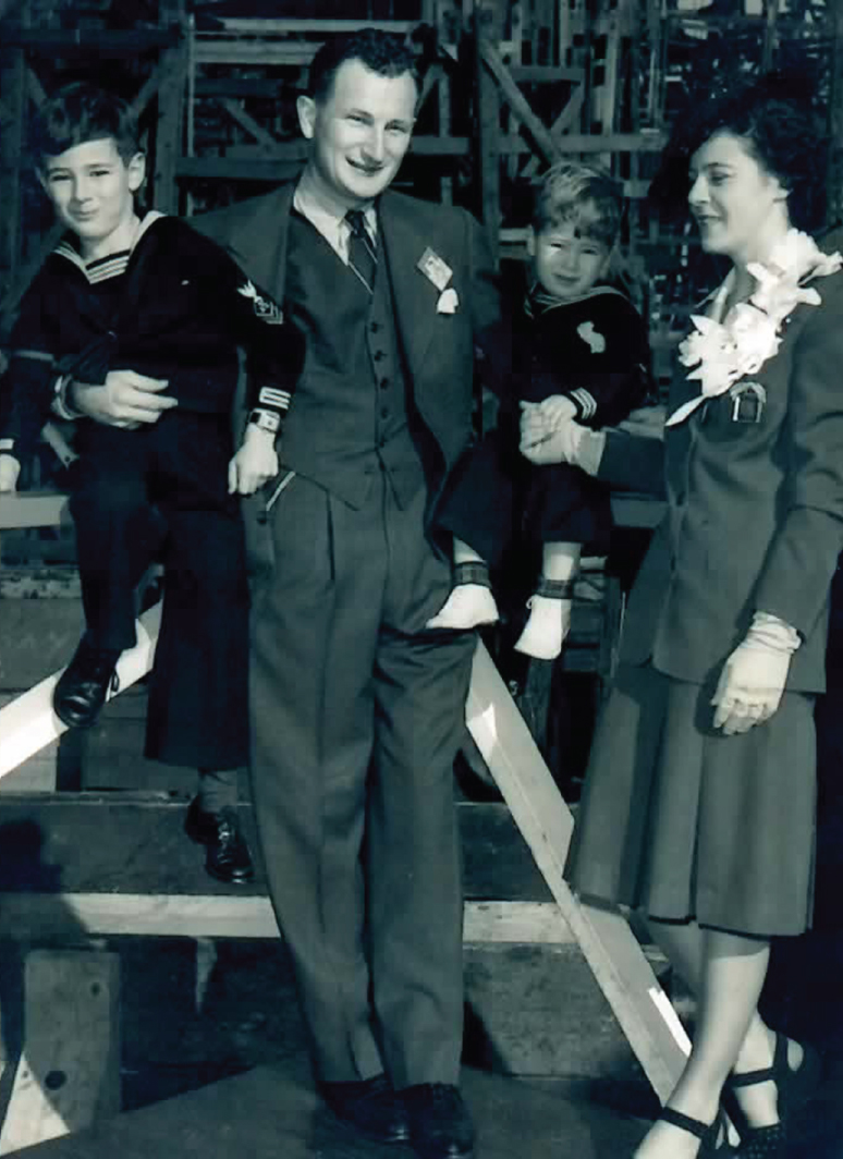 Flora and Jerry Komes with their children, Mike and John.