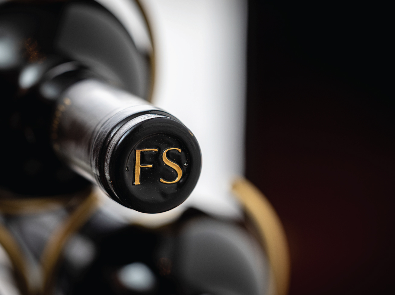 FS logo on wine bottle cap.