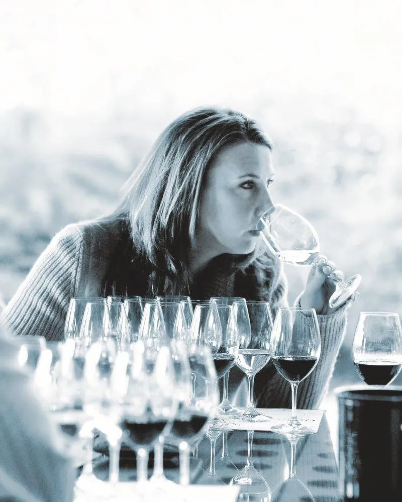 Gina drinking wine